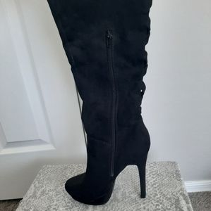 Black thigh high boots